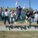 Green Team Members Jumping in Greensburg