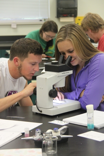Students with Microscopes