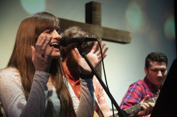 Students singing at Chapel