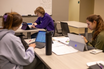 Students in classroom with laptops